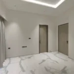 8 BHK Jodi Windsor Grande Andheri West Bedroom With Two Wooden Doors And Cove Lighting