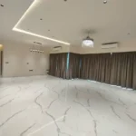 8 BHK Jodi Windsor Grande Andheri West Living Room With Crystal Chandelier And Cove Lighting