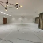 8 BHK Jodi Windsor Grande Andheri West Living Room With Veined Floor And Chandeliers