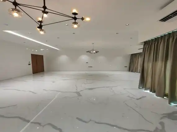 8 BHK Jodi Windsor Grande Andheri West Living Room With Veined Floor And Chandeliers