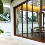 Sanctuary Boheim 3 BHK Villa Siolim Goa Poolside Patio with Glass Dining Room Doors