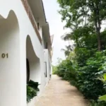 Sanctuary Boheim 3 BHK Villa Siolim Goa Villa Entrance with Arched Doorway and Garden Path