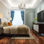2 BHK Baya Sunrise Dadar Classic Bedroom With Blue Accent Wall, Drum Chandelier
