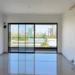 3 BHK Amaris Park Matunga East Bright Empty Lounge With Glossy Flooring And Skyline Facing Balcony