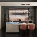 3 BHK Asmi Legacy Unnat Nagar Goregaon Sleek Dark Kitchen Featuring Marble Island Counter