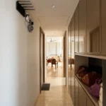 3 BHK Kalpataru Radiance Goregaon Polished Corridor With Built In Storage Units Leading Toward The Lounge