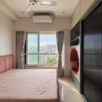 3 BHK Kalpataru Radiance Goregaon Playful Youth Room With Blush Padded Bed Round Reading Nook