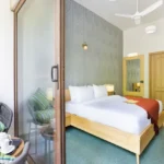 3 BHK Mayberry Villas Anjuna Goa Contemporary Sleep Space With Diamond Pattern Feature Wall And Private Sit Out