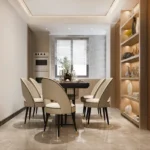 3 BHK Sosar Jade Bandra West Elegant Dining Room With Round Table, Curved Upholstered Chairs And Lit Wooden Display Shelving Unit