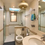 4 BHK Cannon Bandra West Clean Washroom With Cream Wall Tiles Marble Counter Basin