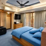 4 BHK Cannon Bandra West Restful Sleeping Quarters With Leather Recliner Drapes And Garden Door Access
