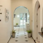 4 BHK Isprava Villa Viastro Pernem Goa Hallway with Arched Doorways and Patterned Floor