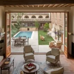 4 BHK Isprava Villa Viastro Pernem Goa Living Room Opening onto Poolside Patio