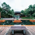 4 BHK Isprava Villa Viastro Pernem Goa Reflecting Pond with Fountains and Palm Trees