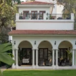 1. 4 BHK Isprava Villa Viastro Pernem Goa Villa Facade with Arched Porch and Balcony