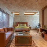 4 BHK Penthouse Bharat Skyvistas DN Nagar Andheri West Bedroom With Orange Sofa And Television