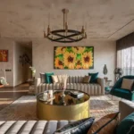 4 BHK Penthouse Bharat Skyvistas DN Nagar Andheri West Living Room With Sofas And Floral Artwork