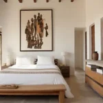 4.5 BHK Isprava Lumosa Aldona Goa Bedroom With Framed Art And Wooden Bench