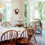 4.5 BHK Isprava Lumosa Aldona Goa Dining Room With Wooden Chairs And Red Candles