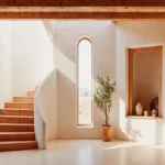 4.5 BHK Isprava Lumosa Aldona Goa Staircase With Wooden Steps And Tall Arched Window