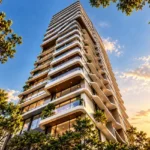 Amaris Park Matunga East Curved Balcony High Rise Glowing In Golden Light Framed By Tree Branches