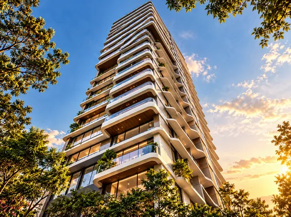 Amaris Park Matunga East Curved Balcony High Rise Glowing In Golden Light Framed By Tree Branches