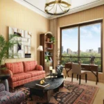 Hiranandani Maitri Park Chembur 3 BHK Warm Work Nook With Coral Striped Sofa Bookshelves
