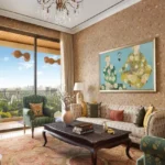 Hiranandani Maitri Park Chembur 4 BHK Refined Drawing Room With Printed Armchairs Dark Wood Center Table