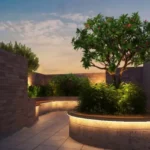 Ivory Heights Vile Parle Warm Lit Circular Plumeria Planter Dusk Rooftop Garden