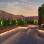 Ivory Heights Vile Parle Tiered Wood Bench Banana Leaf Terrace With Warm Cove Lighting