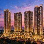Kalpataru Radiance Goregaon Four Illuminated High Rise Towers Glowing Against A Purple Dusk Sky