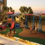 One Vara Goregaon Outdoor Children’s Play Zone With A Train Structure, Swings And Open Turf