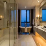 Raya Terraces JVPD Juhu Bathroom With Glass Shower And Freestanding Bathtub