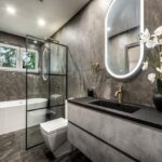 Roswalt Ryla SV Road Bandra West Luxury Bathroom With Grey Marble Walls Freestanding White Tub