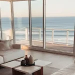 W 291 Sambhav Walkeshwar Sea Facing Living Room With White Sofas And Balcony