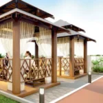 West 10 Juhu Gully Teak Gazebo With Sheer Drapes And Diamond Lattice Railing Terrace
